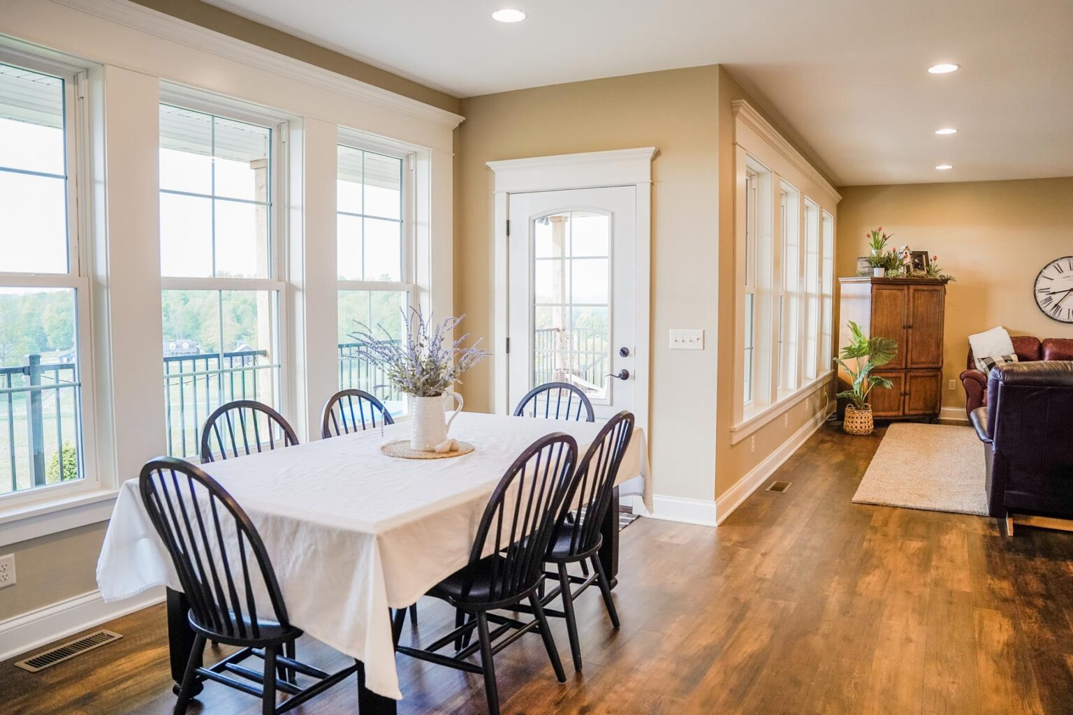 Bright dining area with table and chairs.