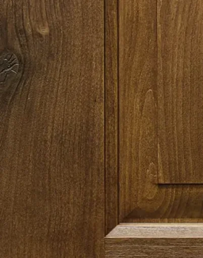 Wooden cabinet door with natural grain texture.