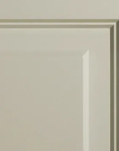 Beige cabinet door with raised panel design.